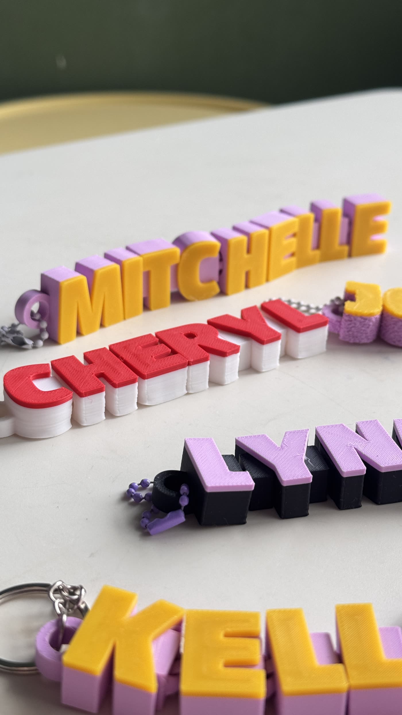 Close-up showing the layered colours and articulated letters