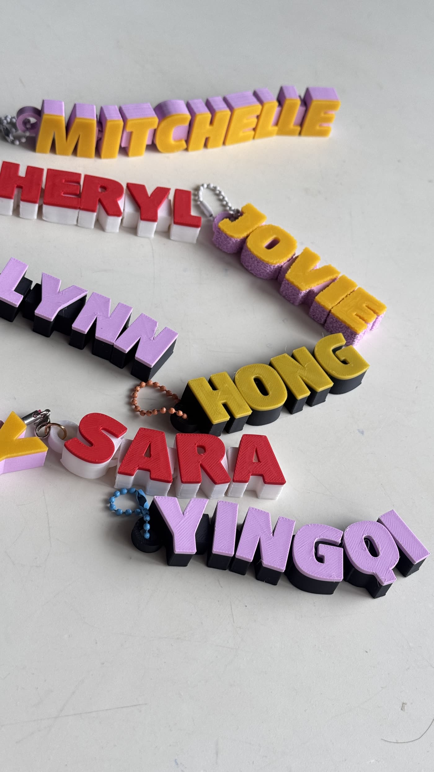 Name keychains in a variety of colour combinations